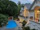 Beautiful backyard with a large pool and a luxurious outdoor kitchen at 510 Covington Cv, Alpharetta, GA 30022