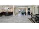 Open recreation room with a billiard table, bar, and fireplace, perfect for entertaining guests at 510 Covington Cv, Alpharetta, GA 30022