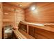 An indoor wooden sauna with comfortable seating and a classic design at 510 Covington Cv, Alpharetta, GA 30022