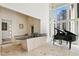 Wet bar with granite counters conveniently located next to the wine cellar and a grand piano at 510 Covington Cv, Alpharetta, GA 30022