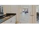 Close-up of the wet bar area leading to the recreation room and seating area at 510 Covington Cv, Alpharetta, GA 30022