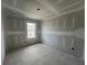 Unfinished bedroom with drywall and window at 2109 Stillhaven Pl, Douglasville, GA 30135