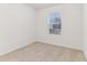 Bedroom with carpet flooring, a window with blinds, and white walls at 2109 Stillhaven Pl, Douglasville, GA 30135