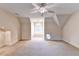 Cozy bedroom with neutral carpet, window, and sloped ceiling at 3871 River Mansion Dr, Peachtree Corners, GA 30096