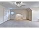 Bedroom featuring neutral carpet, arched niche, and double door closet at 3871 River Mansion Dr, Peachtree Corners, GA 30096