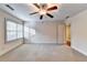 Bedroom with neutral carpet, ceiling fan, and natural light at 3871 River Mansion Dr, Peachtree Corners, GA 30096