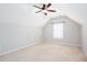 Neutral bedroom with a ceiling fan and window allowing natural light to flow in at 500 Sapphire Valley Ln, Canton, GA 30114