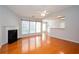 Bright living room with fireplace, ceiling fan and large windows at 500 Sapphire Valley Ln, Canton, GA 30114