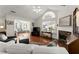 Bright living room with fireplace and large windows, offering plenty of natural light at 938 Burnt Hickory Nw Cir, Marietta, GA 30064