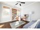 Bedroom featuring a desk and bookshelves with natural light from a window at 152 Park Dr, Decatur, GA 30030