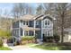 Charming two-story home featuring a welcoming front porch and manicured landscaping at 152 Park Dr, Decatur, GA 30030