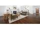Cozy living room featuring a fireplace, built-in shelves, and hardwood floors at 152 Park Dr, Decatur, GA 30030