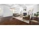 Bright living room with a fireplace, built-in bookshelves, and large windows at 152 Park Dr, Decatur, GA 30030