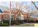 Exterior of Winnona Park School building with flag pole and landscaping at 152 Park Dr, Decatur, GA 30030