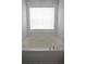 Clean bathtub with chrome fixtures set against white mosaic tile at 200 Stone Lake Dr, Dallas, GA 30157