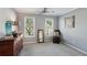 Bright bedroom with a chair, a dresser and two windows offering lots of natural light at 4212 Lazy Creek Dr, Marietta, GA 30066