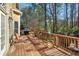 Outdoor deck with seating and a grill, perfect for entertaining at 4212 Lazy Creek Dr, Marietta, GA 30066