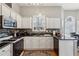 Well-equipped kitchen with granite countertops, modern appliances, and ample cabinet space at 4212 Lazy Creek Dr, Marietta, GA 30066