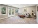 Bright, spacious living room with a comfortable sofa and access to the backyard at 4212 Lazy Creek Dr, Marietta, GA 30066