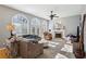 Spacious living room with large windows, a fireplace, and comfortable furnishings at 4212 Lazy Creek Dr, Marietta, GA 30066