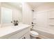Bathroom featuring a single sink vanity and shower over tub at 163 Bluffington Way, Marietta, GA 30066