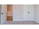 Bedroom with closet featuring carpet flooring, closet, and neutral paint at 163 Bluffington Way, Marietta, GA 30066