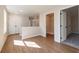 Bright hallway with wood floors that features an open walk-in closet at 163 Bluffington Way, Marietta, GA 30066