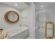 Bathroom featuring a soaking tub and a glass door shower with gold hardware at 3636 Habersham Nw Rd # 2208, Atlanta, GA 30305