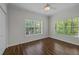 Bedroom featuring hardwood floors and windows providing lots of natural light at 3636 Habersham Nw Rd # 2208, Atlanta, GA 30305