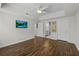Bright bedroom featuring hardwood floors, a ceiling fan and a television at 3636 Habersham Nw Rd # 2208, Atlanta, GA 30305
