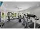 Community gym featuring lots of workout equipment and multiple windows providing natural light at 3636 Habersham Nw Rd # 2208, Atlanta, GA 30305