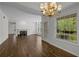 Open living room features hardwood floors, fireplace, and great natural light at 3636 Habersham Nw Rd # 2208, Atlanta, GA 30305