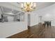 Living space includes view to updated kitchen and a traditional fireplace at 3636 Habersham Nw Rd # 2208, Atlanta, GA 30305