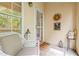 Cozy porch with neutral patio furniture and decorative art at 3636 Habersham Nw Rd # 2208, Atlanta, GA 30305