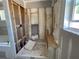 Unfinished bathroom with shower, bathtub, and insulation at 4300 Easter Lily Ave Lot 11, Buford, GA 30519
