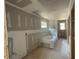 Spacious bathroom featuring a large soaking tub under construction with a window view at 4300 Easter Lily Ave Lot 11, Buford, GA 30519