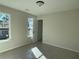 Neutral bedroom with a window offering pleasant views of the outdoors at 4300 Easter Lily Ave Lot 11, Buford, GA 30519