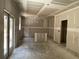 Spacious kitchen featuring drywall with glass doors that bring in light at 4300 Easter Lily Ave Lot 11, Buford, GA 30519