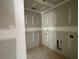 Laundry room under construction with connections for washer and dryer at 4300 Easter Lily Ave Lot 11, Buford, GA 30519
