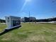 Exterior shot of Seckinger High School with well-manicured lawn in front at 4300 Easter Lily Ave Lot 11, Buford, GA 30519