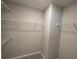 Large walk-in closet provides ample storage with extensive shelving and hanging space at 4300 Easter Lily Ave Lot 11, Buford, GA 30519