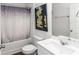 Bathroom with vanity, sink, and a shower with a decorative curtain at 891 Feldman Chase, Loganville, GA 30052