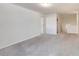 Spacious bedroom with neutral walls and carpet, showcasing a bright and airy feel at 891 Feldman Chase, Loganville, GA 30052