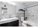 Modern bathroom featuring a sleek vanity, contemporary fixtures, and a stylish tiled shower at 2006 Riverview Dr, Marietta, GA 30067