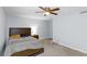 Serene bedroom features a neutral palette, ceiling fan, and a comfortable bed at 2006 Riverview Dr, Marietta, GA 30067