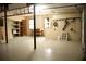 Spacious garage with workbench, storage, and tools hanging on the wall at 3348 Summit Turf Ln, Snellville, GA 30078