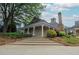 Charming clubhouse with classic architecture, surrounded by beautiful landscaping and greenery at 216 Tennis Court Nw Ln, Kennesaw, GA 30144