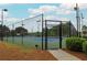 Well-maintained tennis courts with a secure fence, inviting residents to enjoy outdoor recreation at 216 Tennis Court Nw Ln, Kennesaw, GA 30144