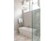 This bathroom features a modern bathtub and a glass enclosed walk-in shower at 321 Mado Ln, Chattahoochee Hills, GA 30268