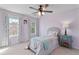 Bedroom with ample natural light, carpeted floors, and neutral colored walls at 4675 Allistair Dr, Cumming, GA 30040
